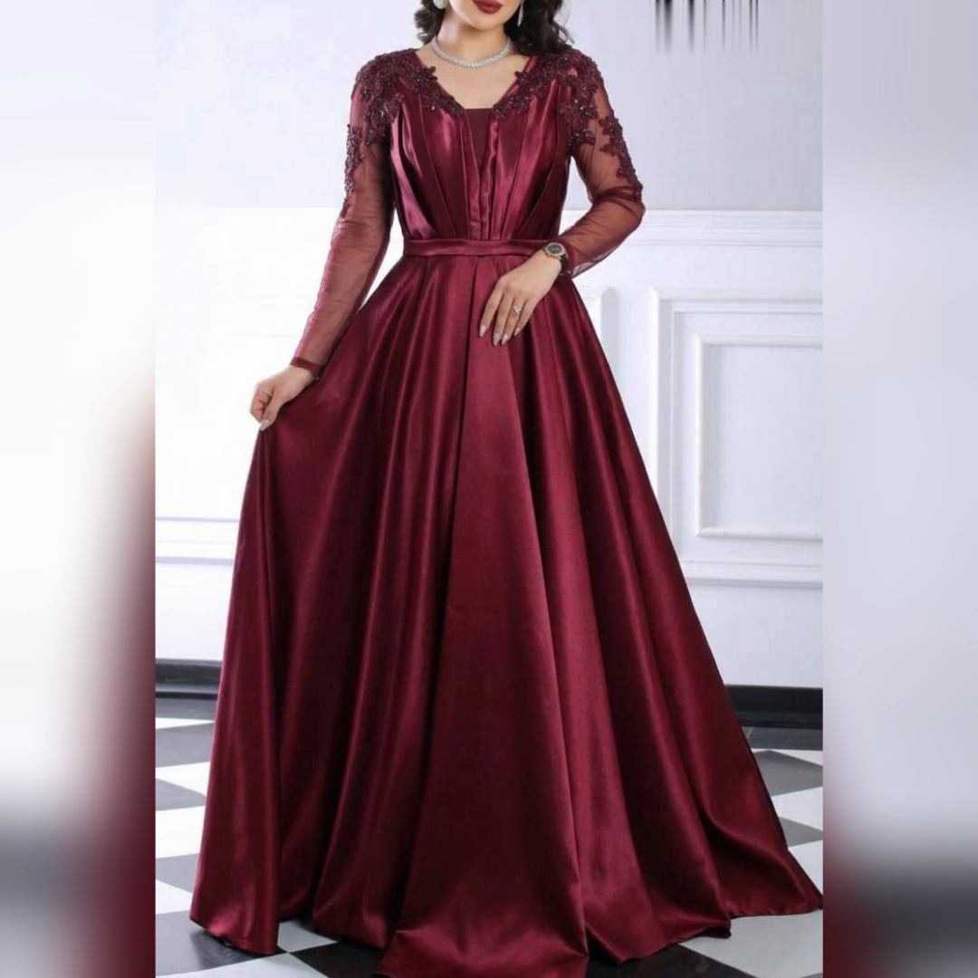 پيراهن مجلسی بلند پوشیده و آستیندار سایز 42 تا 56  جنس ساتن و دارای کاپ سینه