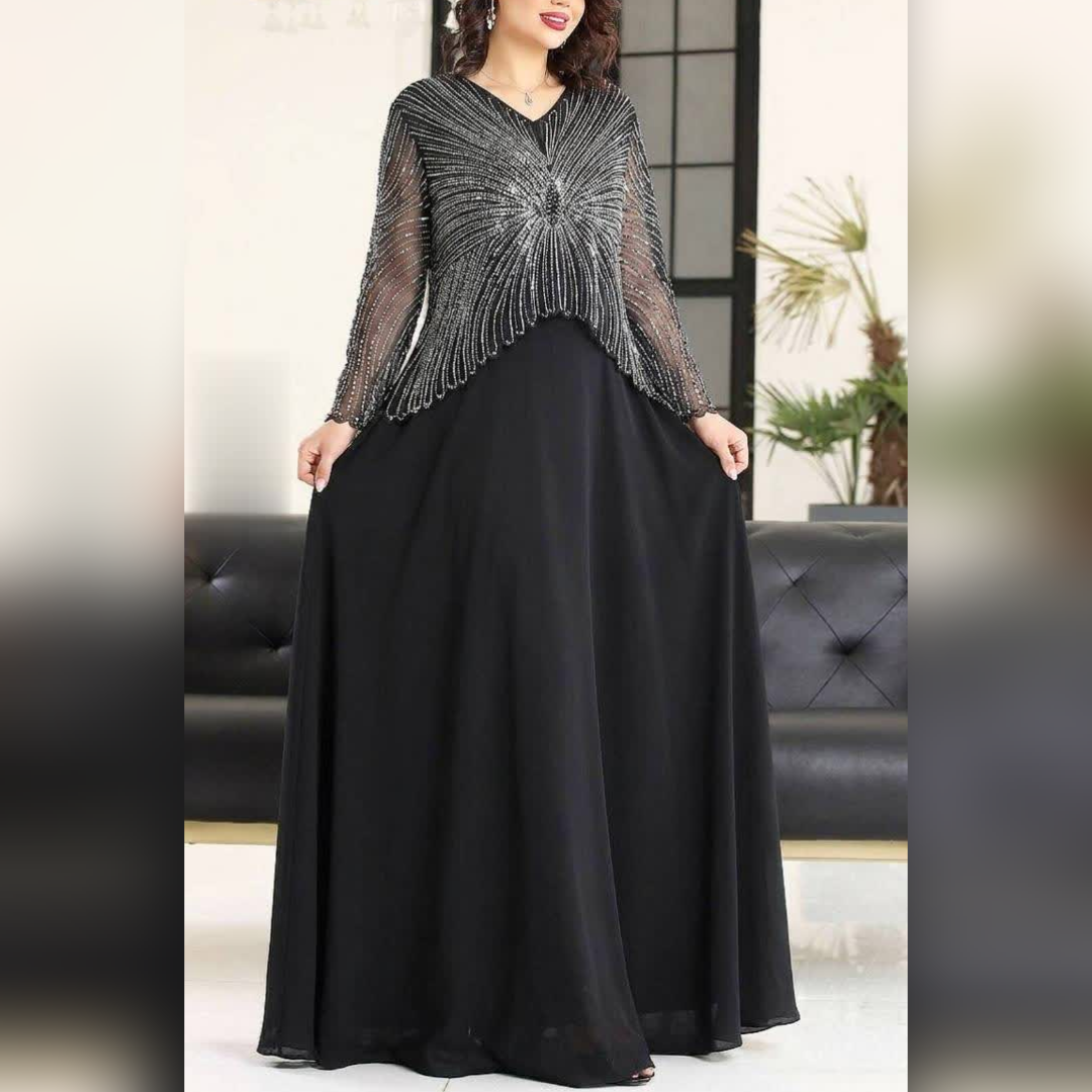 پیراهن ماکسی مجلسی بیگسایز پوشیده و آستین دار ( سایز بزرگ) سایز 46 تا 56 دیزاین شده با نگین  و مروارید کاپدار و دارای آستر